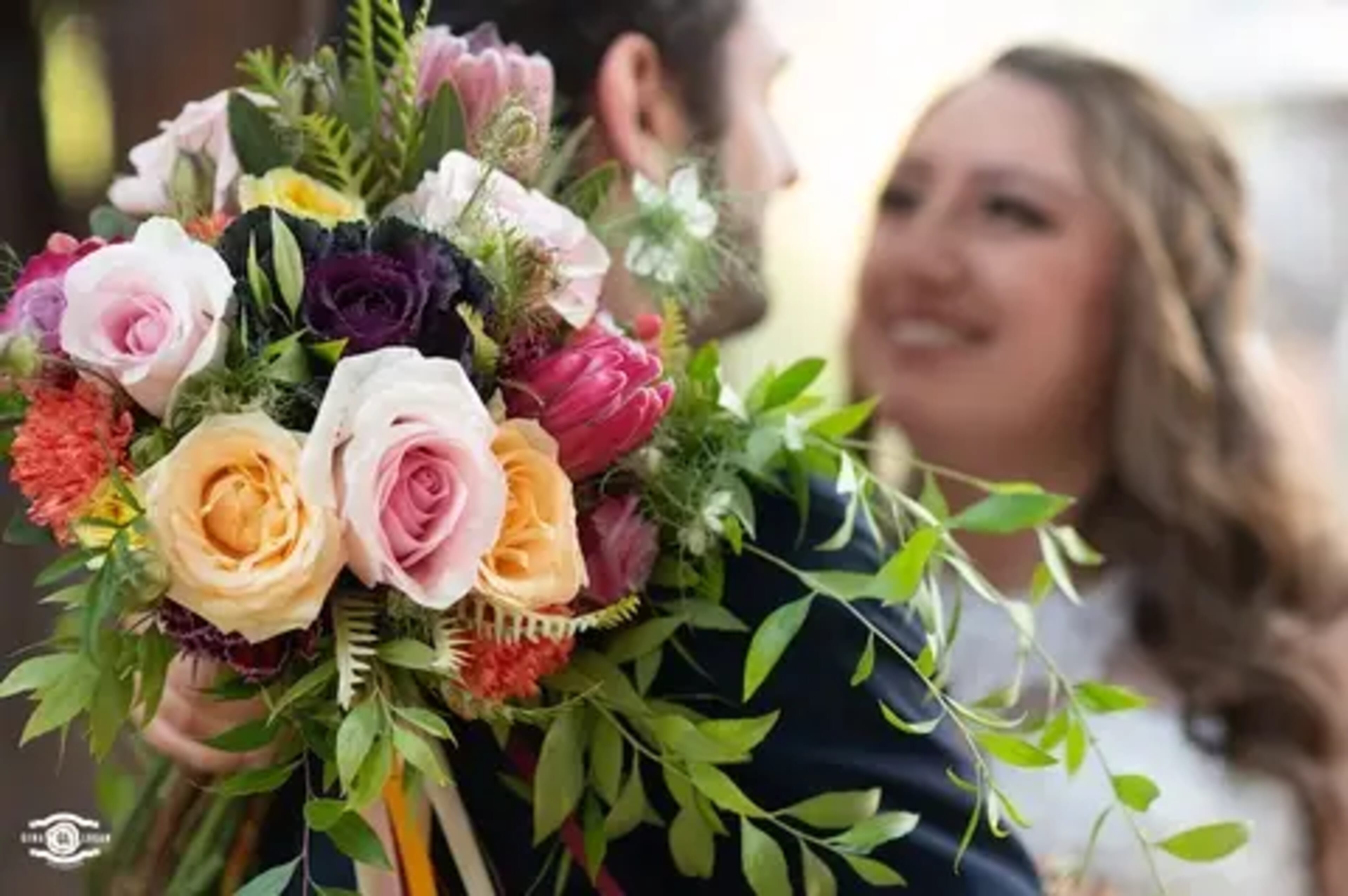 Eric & Kelsey wedding flowers by Frangipani Florist
